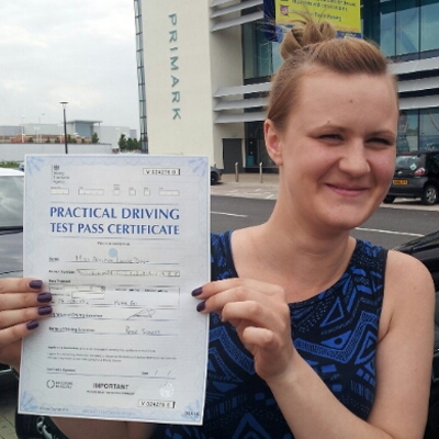 Image of Ashleigh Dixon with pass certificate - Revolution Driving School