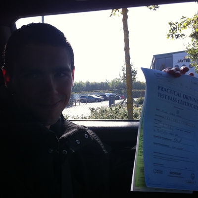 Image of Miles Kasari with pass certificate - Revolution Driving School